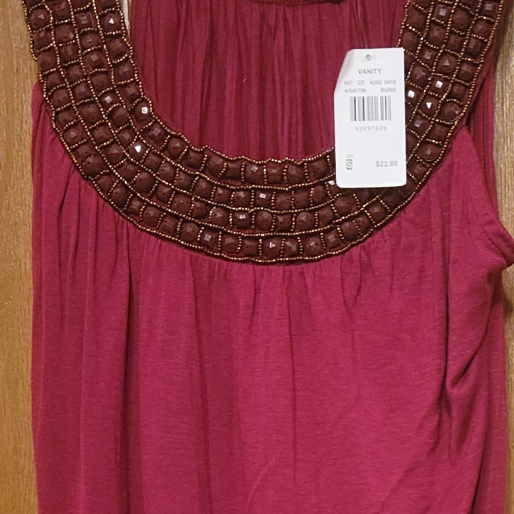 Vanity brand sleeveless shirt with jewels